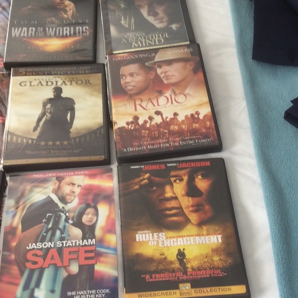 DVD set of 12 movies, includes 2 never opened - Picture 2 of 3